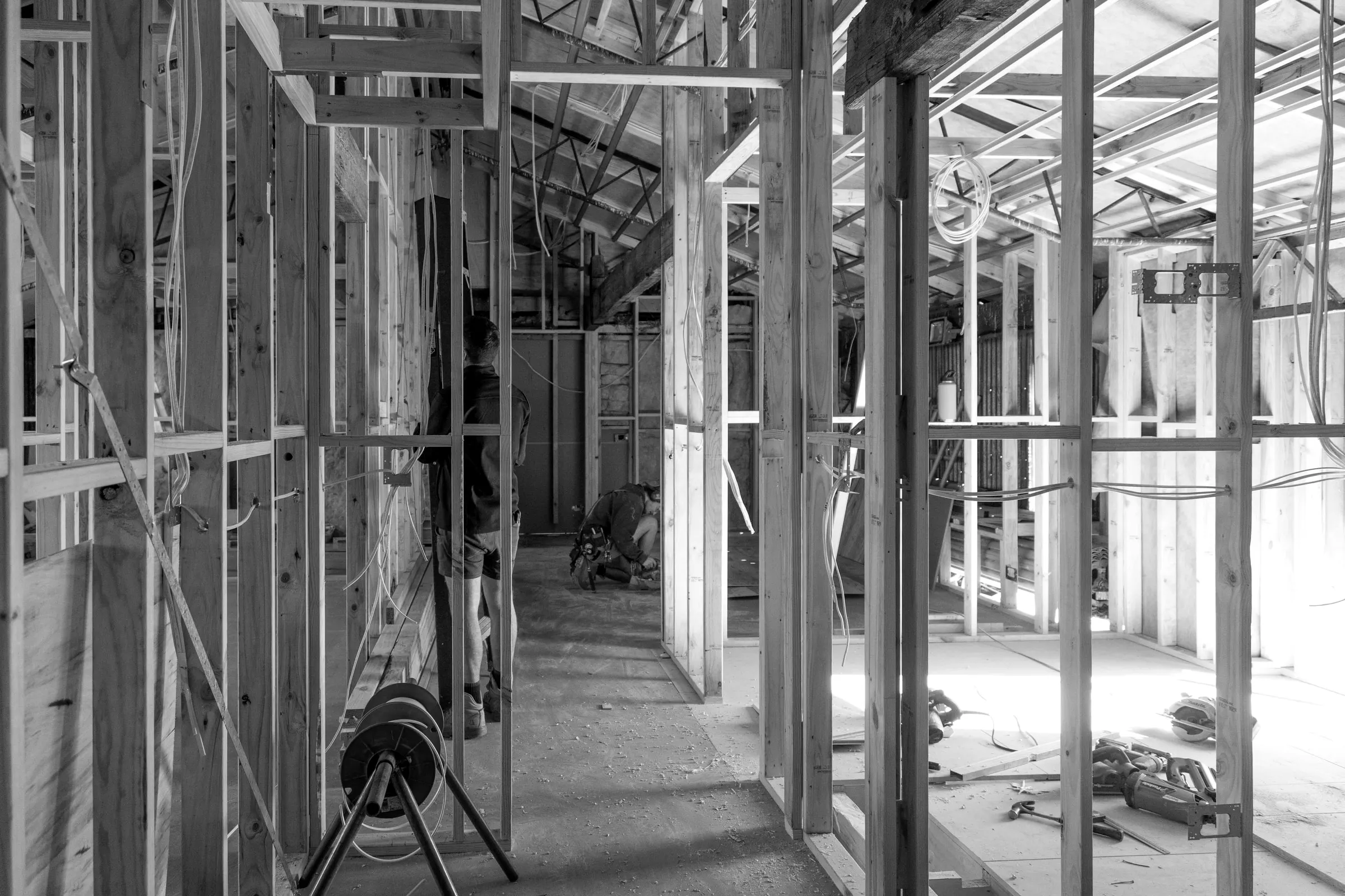 Looking down a framed hallway with wall frames either side, frame stage, Relbia